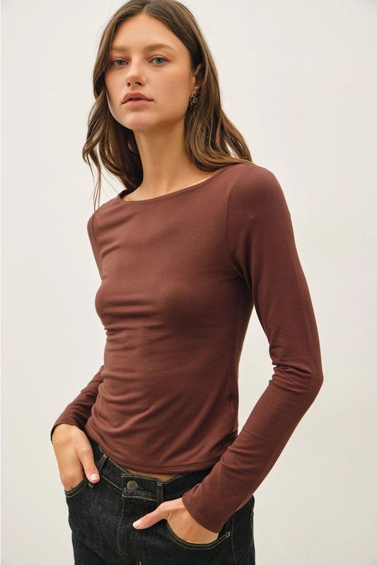woman in long sleeve top