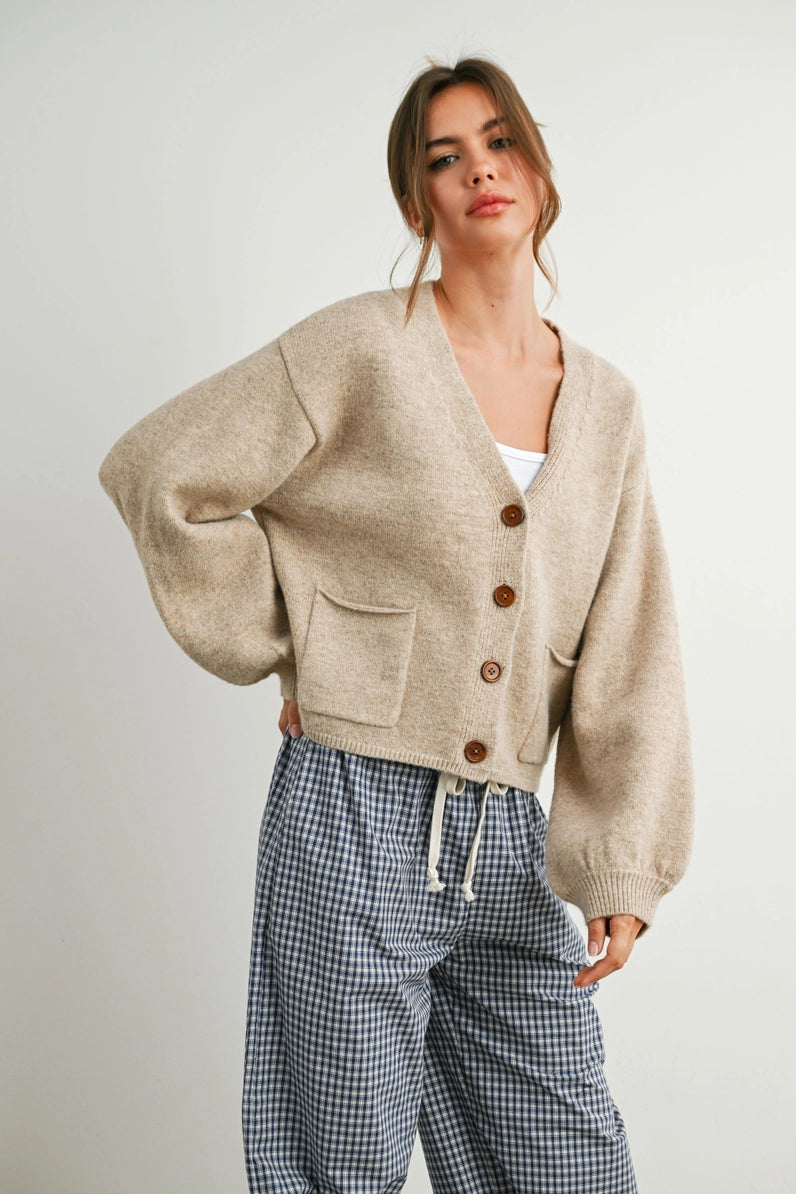 woman in cardi and checkered pants
