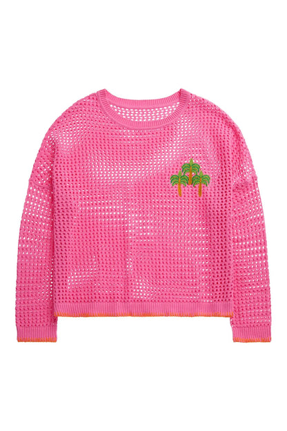 Pink textured sweater with palm tree design on a white background