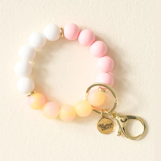 yellow and pink wristlet