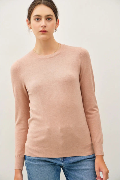 woman wearing sweater with jeans 