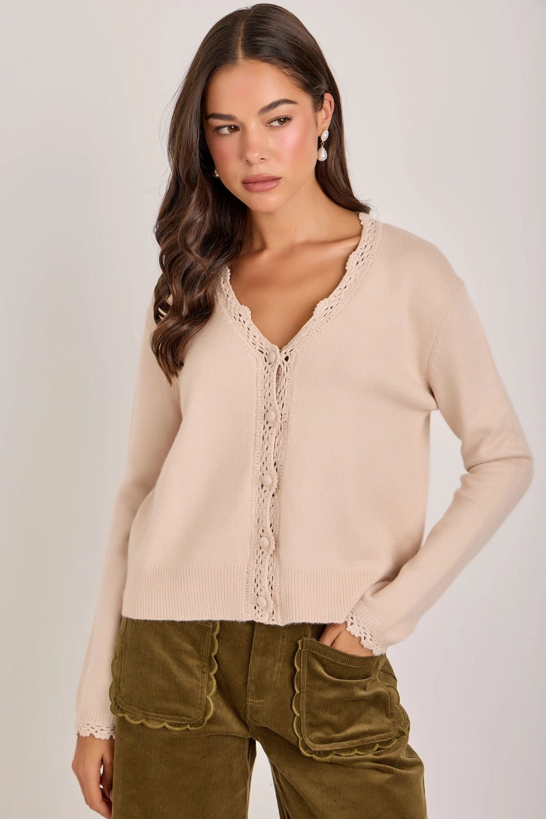 woman in cardigan and pants
