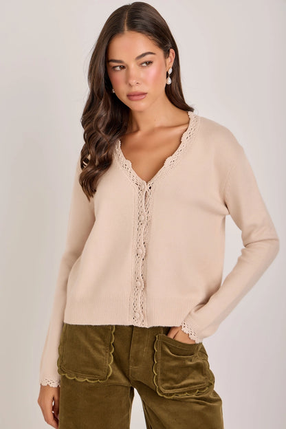 woman in cardigan and pants