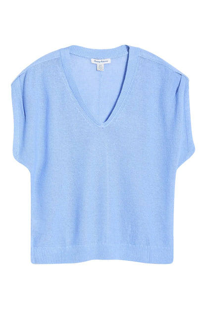 Light blue sleeveless sweater on a white background