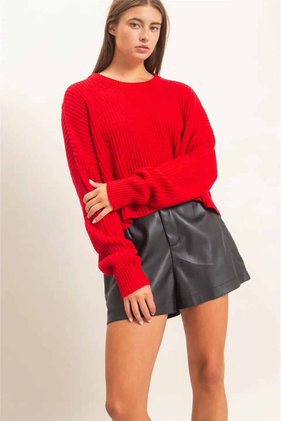 woman wearing red cropped sweater