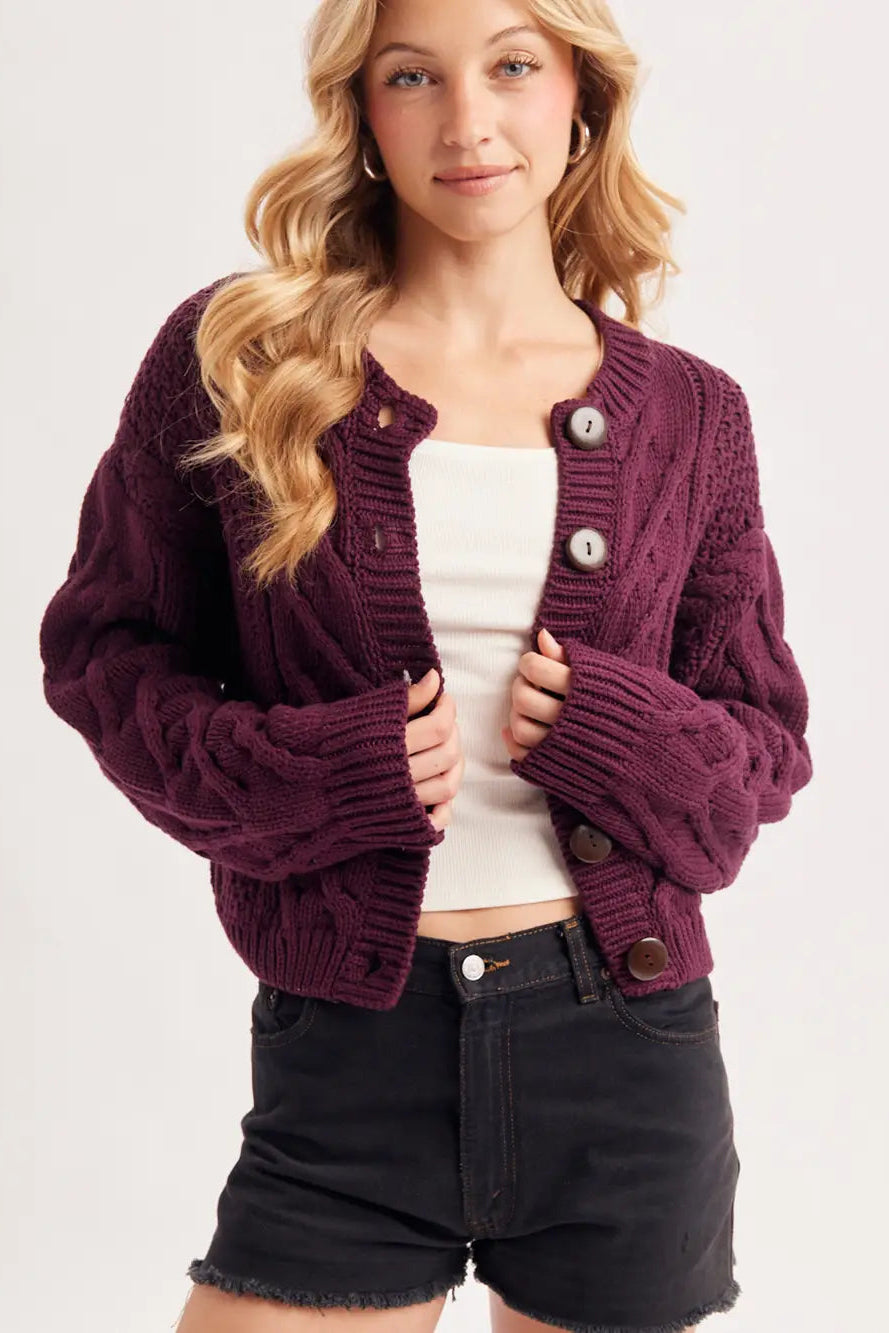 woman wearing cardigan and shorts