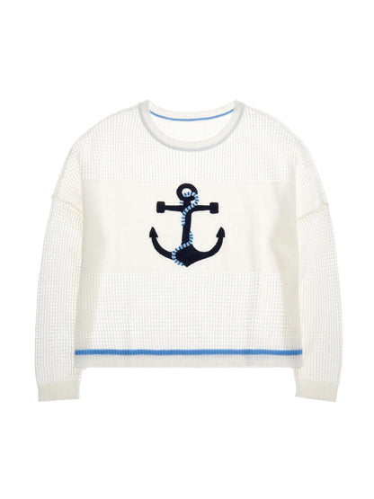 White sweater with an anchor design on a white background
