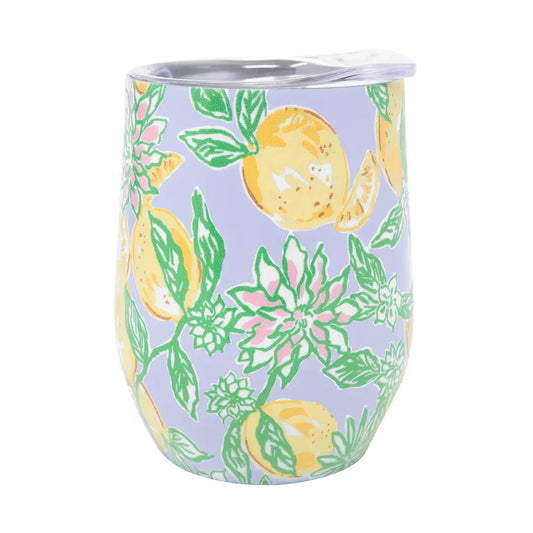 Tumbler with lemon and floral pattern on a light purple background