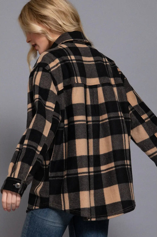 woman in plaid shacket