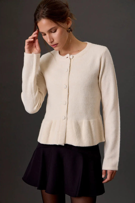 woman in cardigan sweater and skirt 