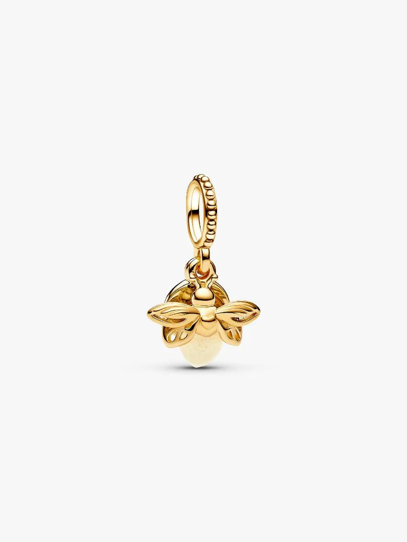Gold bee-shaped pendant on a white background