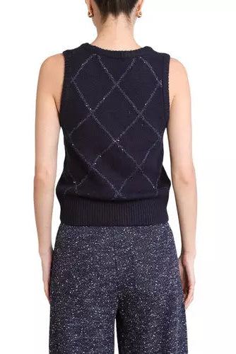 A model shown from the back wearing a sleeveless navy knit sweater vest with a diamond pattern and matching dark pants against a white background.