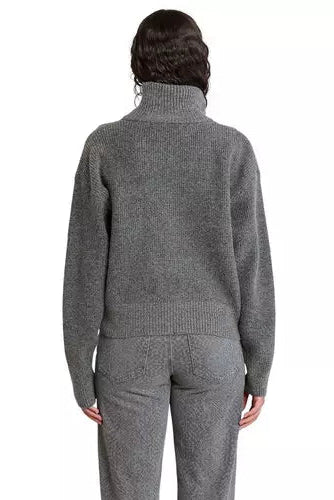 back of woman with gray sweater