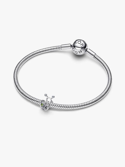 Silver bracelet with charms on a white background