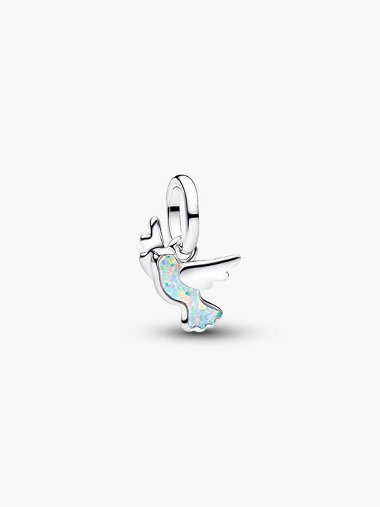 Silver charm with opal-colored gem on a white background