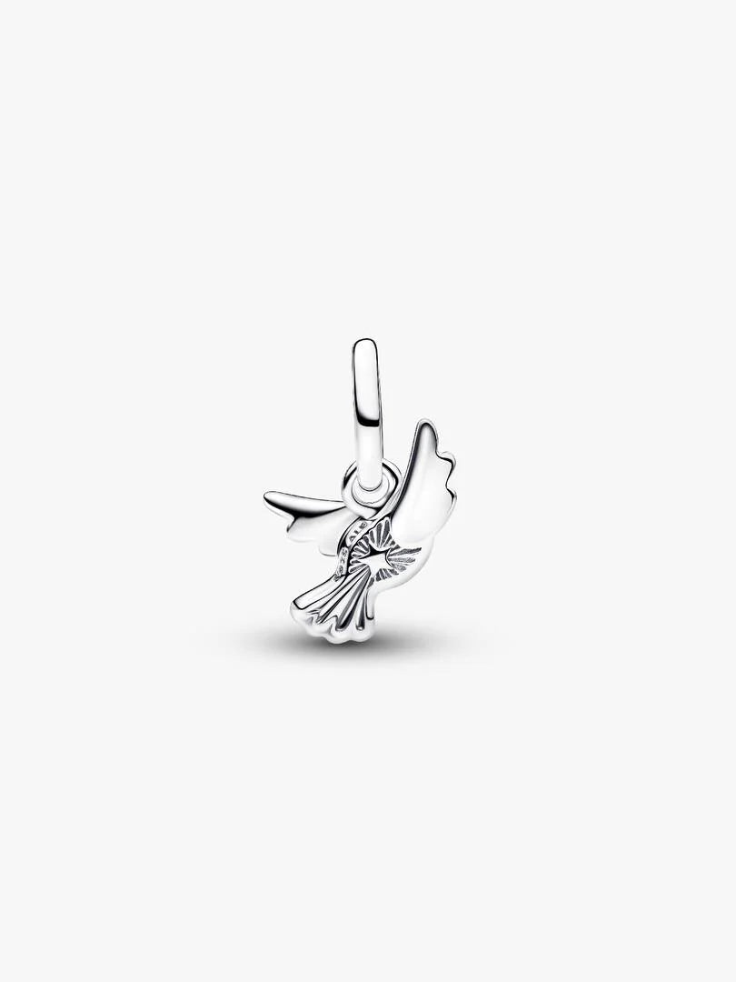 Silver bird-shaped pendant on a white background