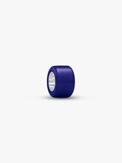 A single dark blue cylindrical ring charm with a silver-toned inner band, shown on a clean white background.
