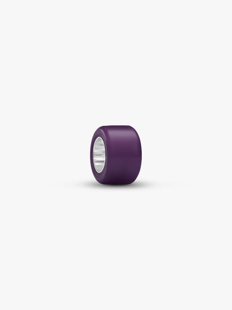 A single dark purple cylindrical bead with a silver metallic inner core, shown on a clean white background.