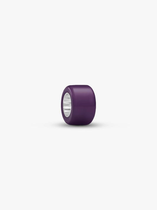 A single dark purple cylindrical bead with a silver metallic inner core, shown on a clean white background.