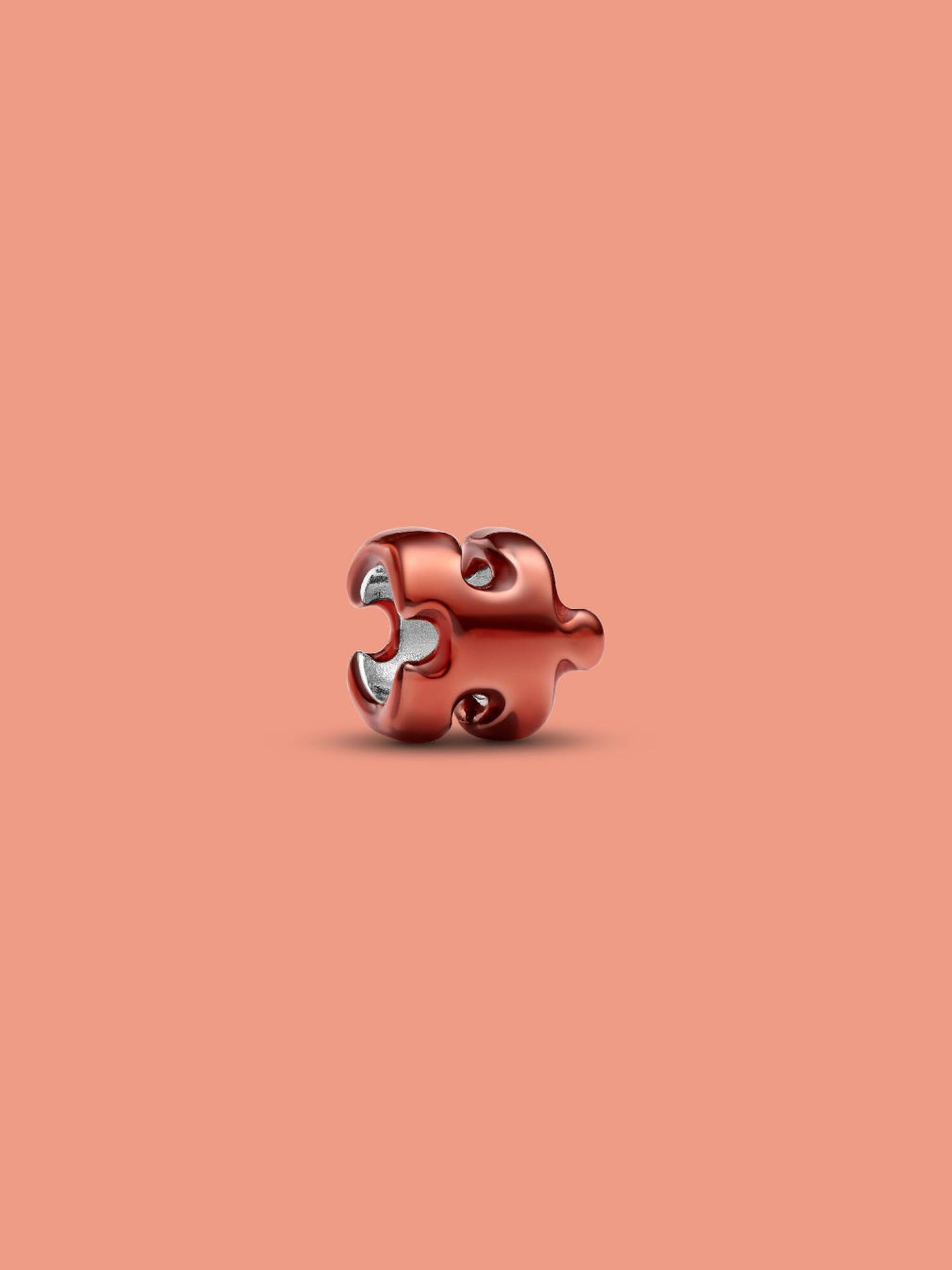 metallic orange puzzle piece charm 