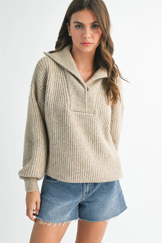 woman in henley sweater and shorts