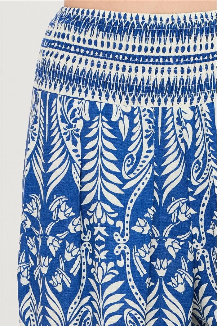 Blue and white patterned skirt on a white background