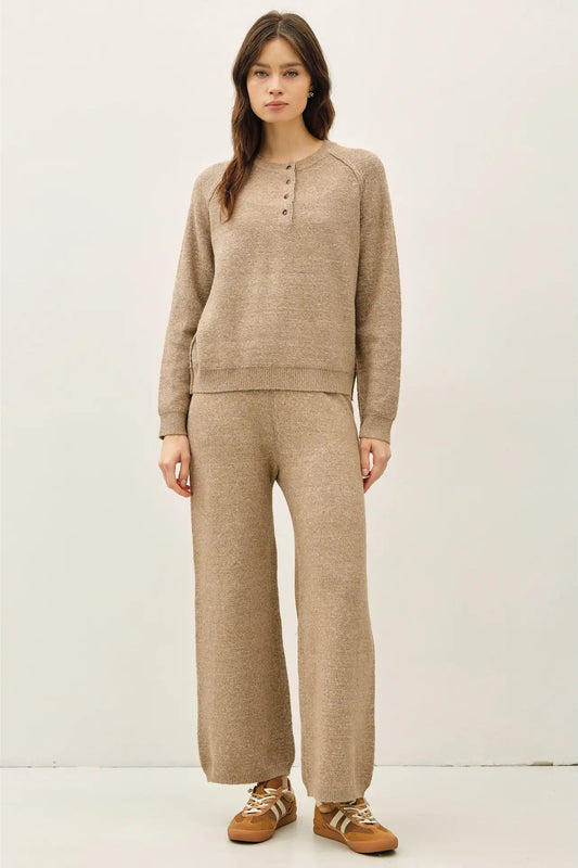 woman in henley sweater and lounge pants