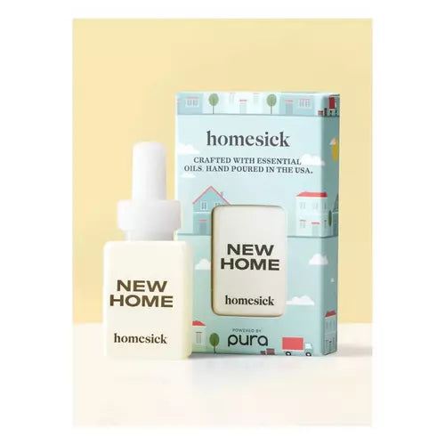 A bottle of homesick New Home essential oil hand-poured in the USA next to its illustrated packaging box by pura, set against a soft pastel yellow background.