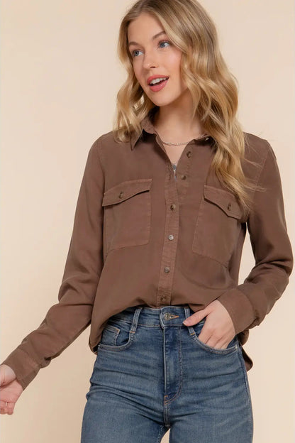 woman in button up shirt and jeans