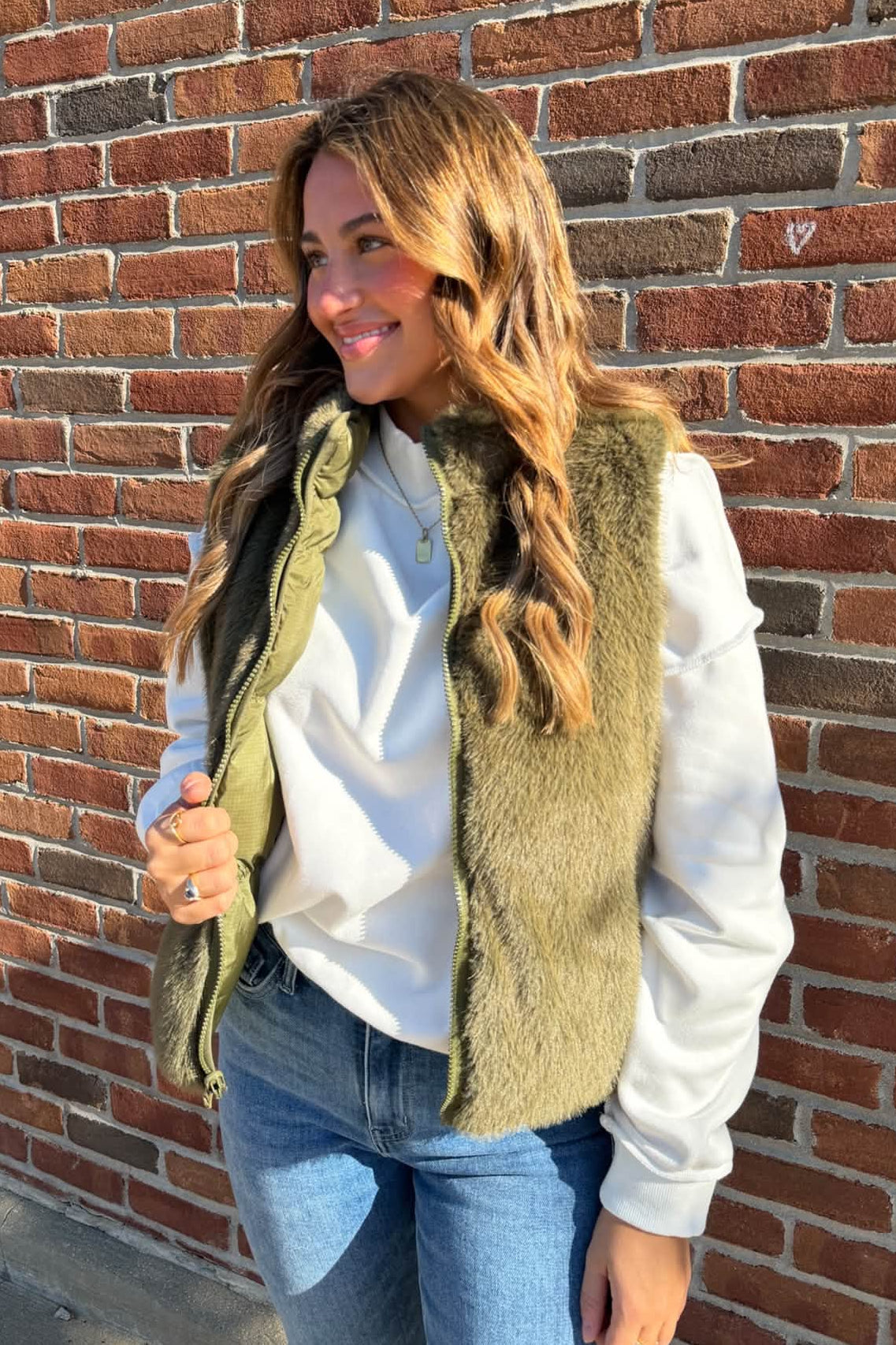 woman in fuzzy vest