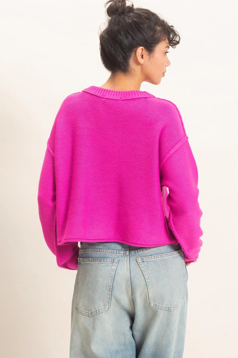 woman wearing pink sweater