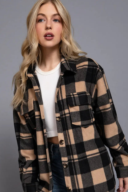 woman in plaid shacket