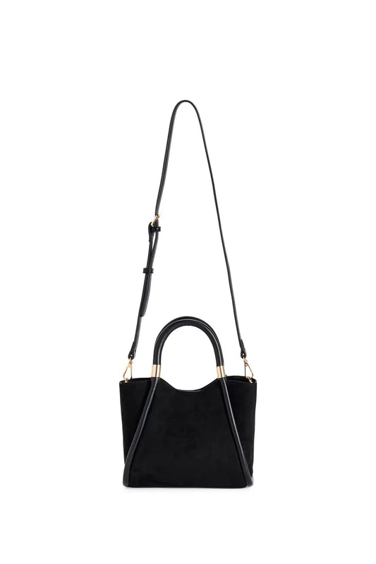 Black beaded handbag with tassel on a white background