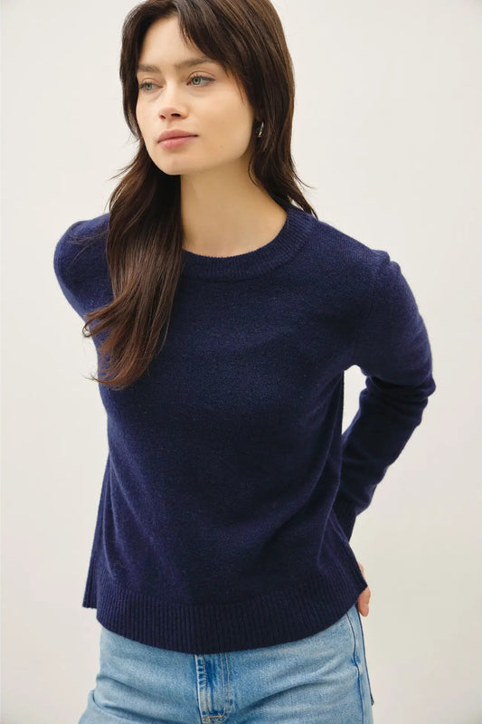 woman in blue sweater