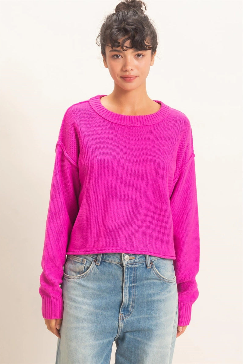 woman wearing pink sweater