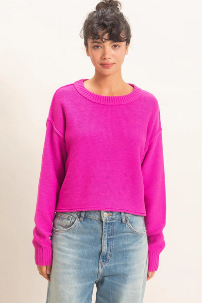 woman wearing pink sweater