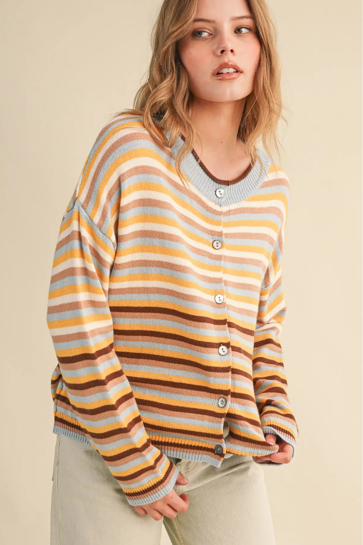 woman in striped cardigan 