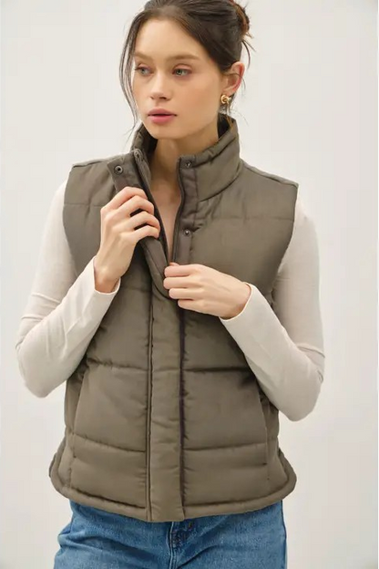 woman wearing puffer vest