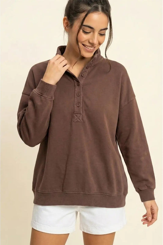 woman in button sweathshirt 