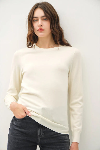 woman wearing sweater with jeans 