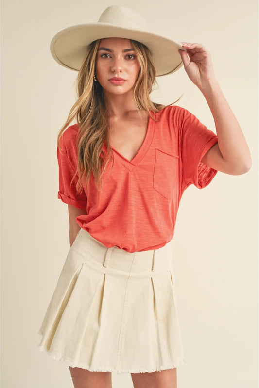 woman wearing v neck tee with hat 