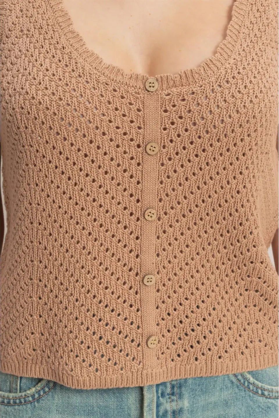 Brown knitted vest with button details on a white background