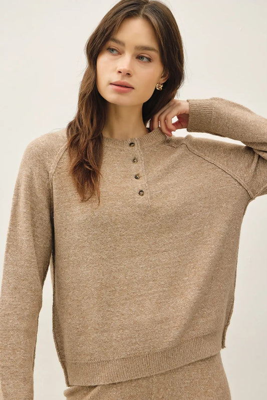woman in henley sweater