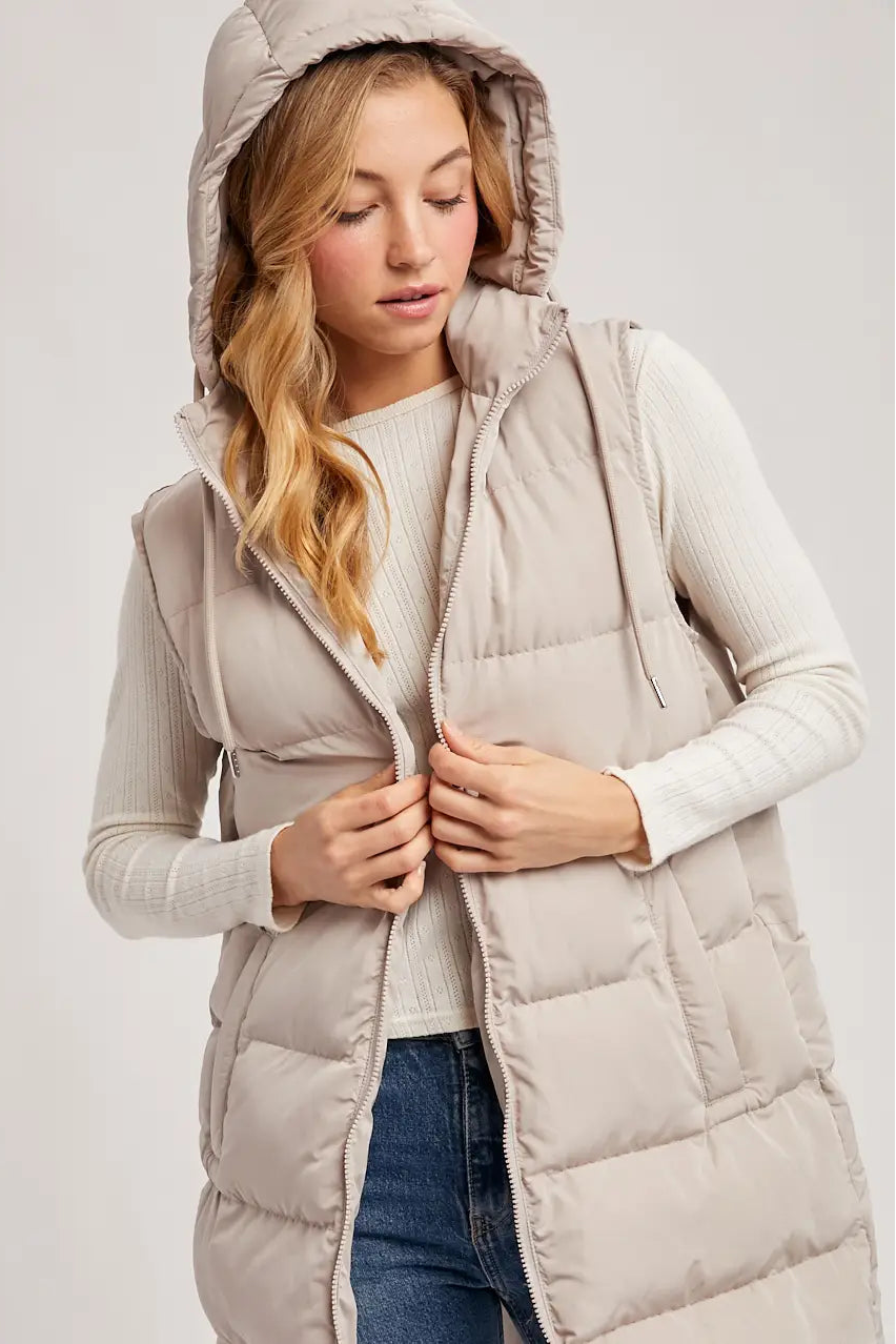 woman in puffer vest