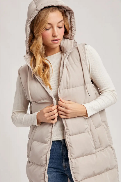 woman in puffer vest