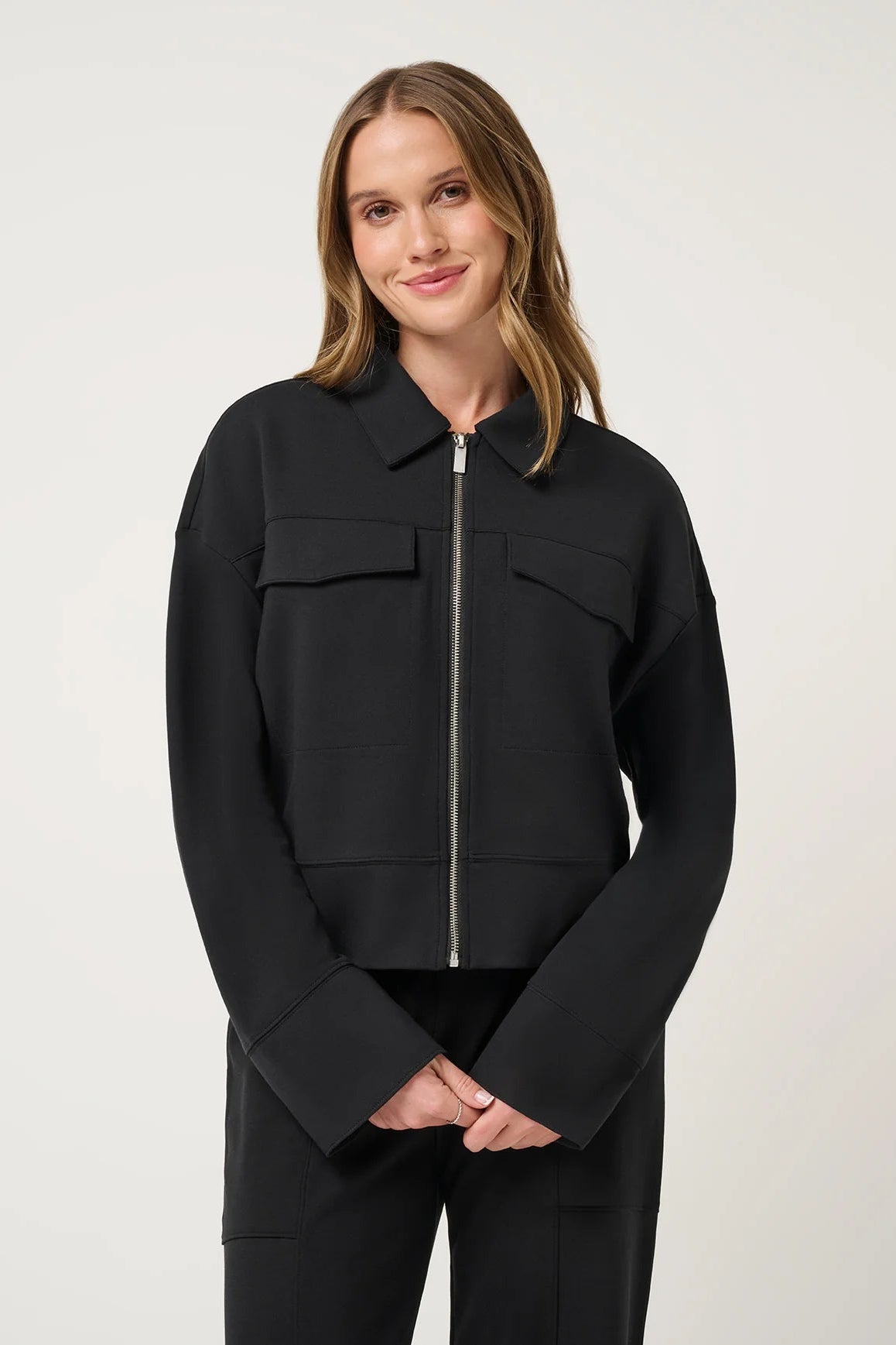 woman in black jacket
