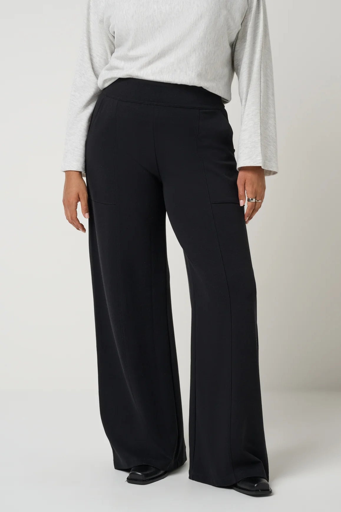 view of person in black pants