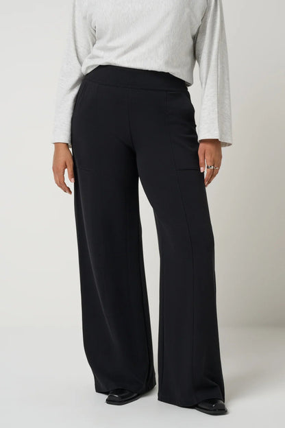 view of person in black pants