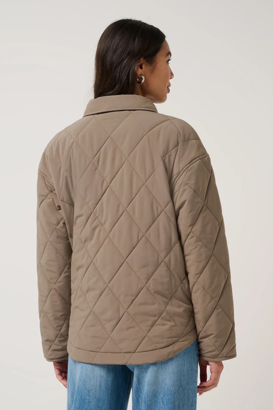 woman in quilted puffer jacket