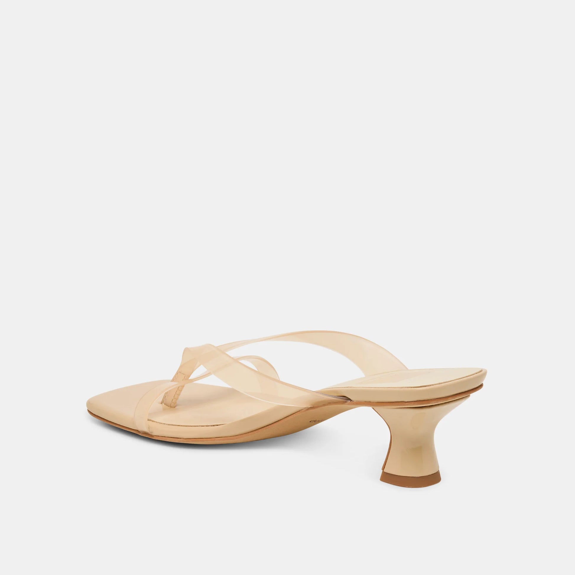 Beige sandal with a low heel on a white background